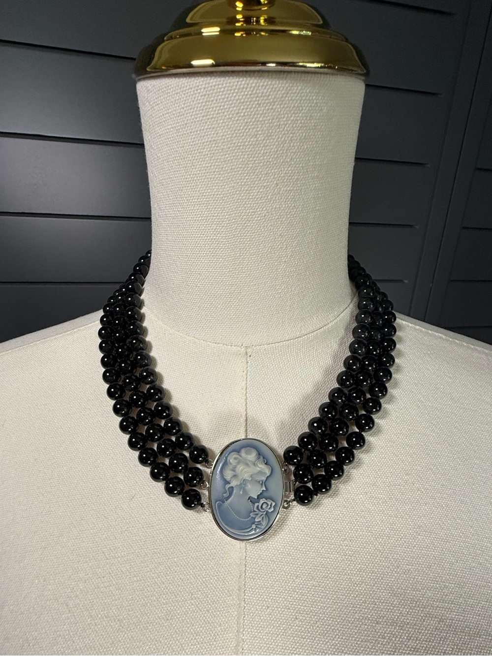 Black Beaded Triple-Strand Necklace with Blue Cameo Pendant